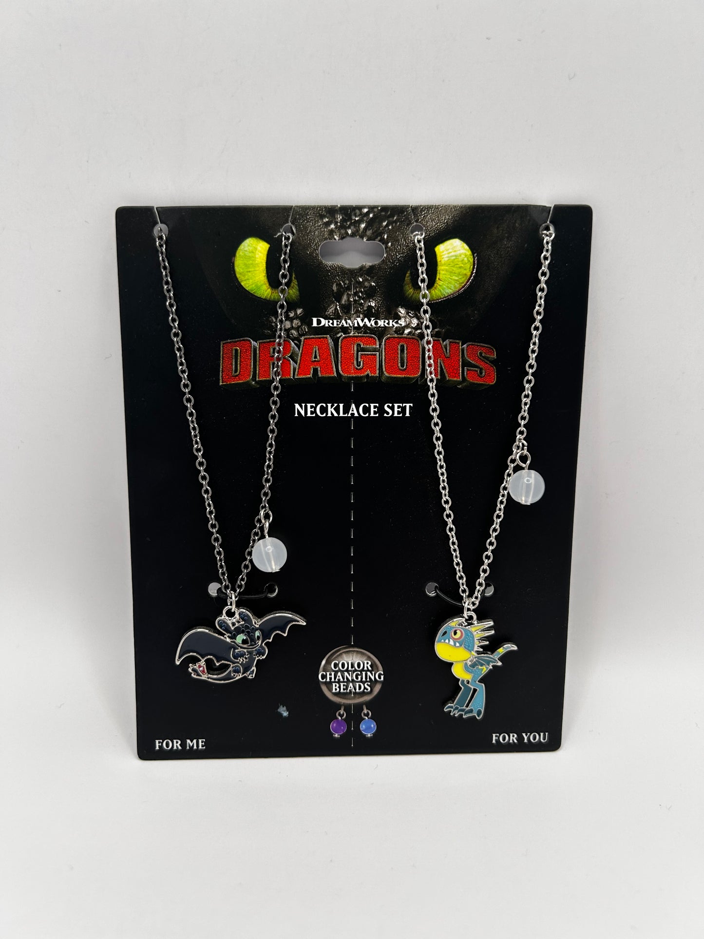 Set de Collares DreamWorks Dragons: Chimuelo y Tormenta