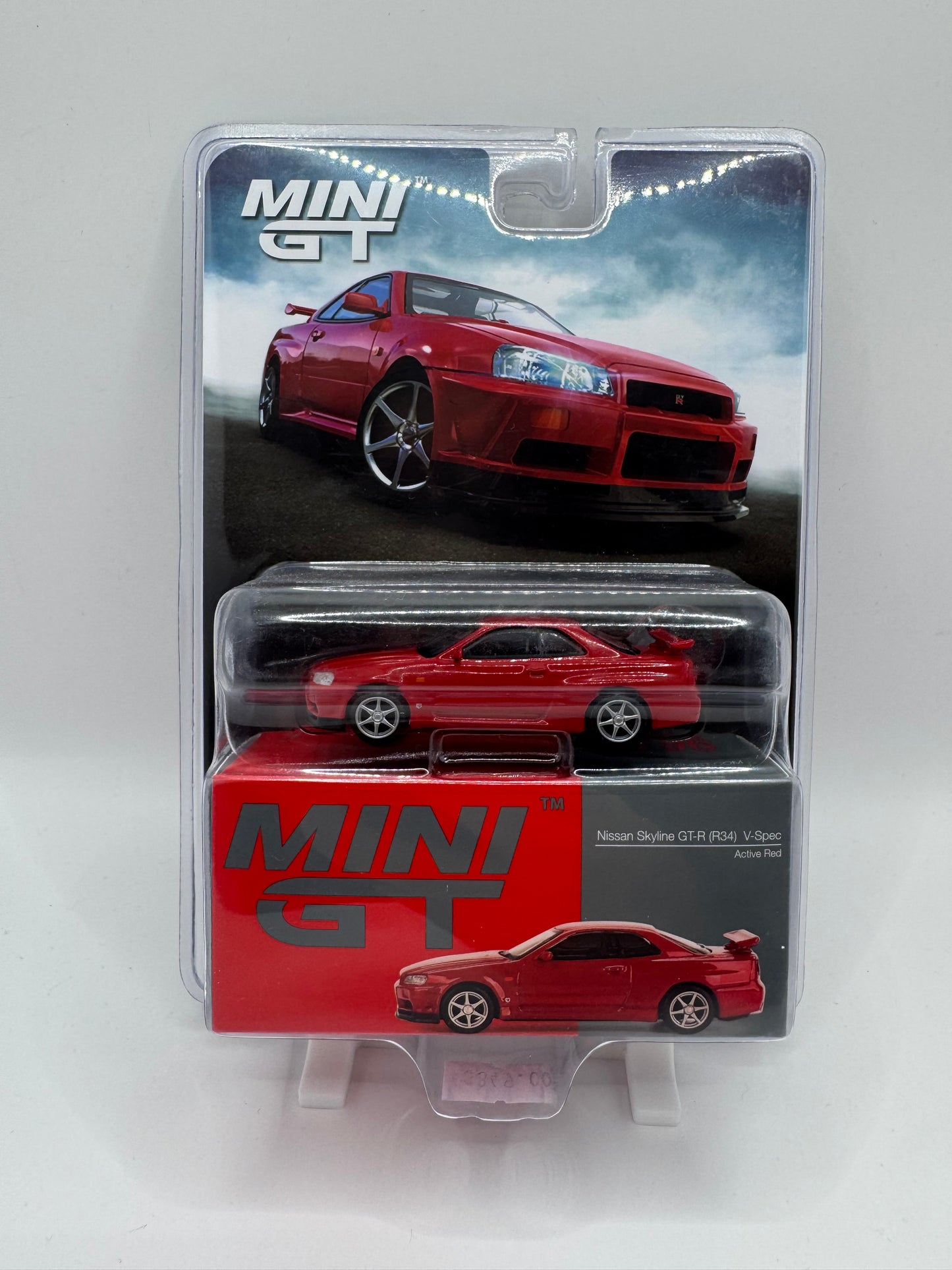 Mini GT: Nissan Skyline GT-R (R34) V-Spec - Active Red