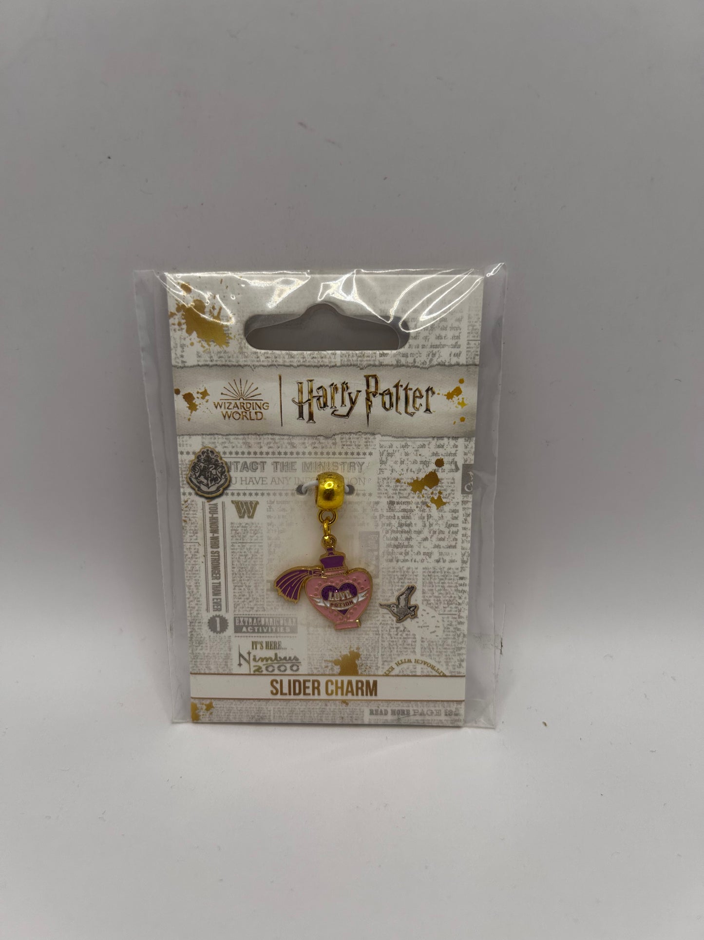 Dije Deslizable "Slider Charm" Harry Potter – Filtro de Amor