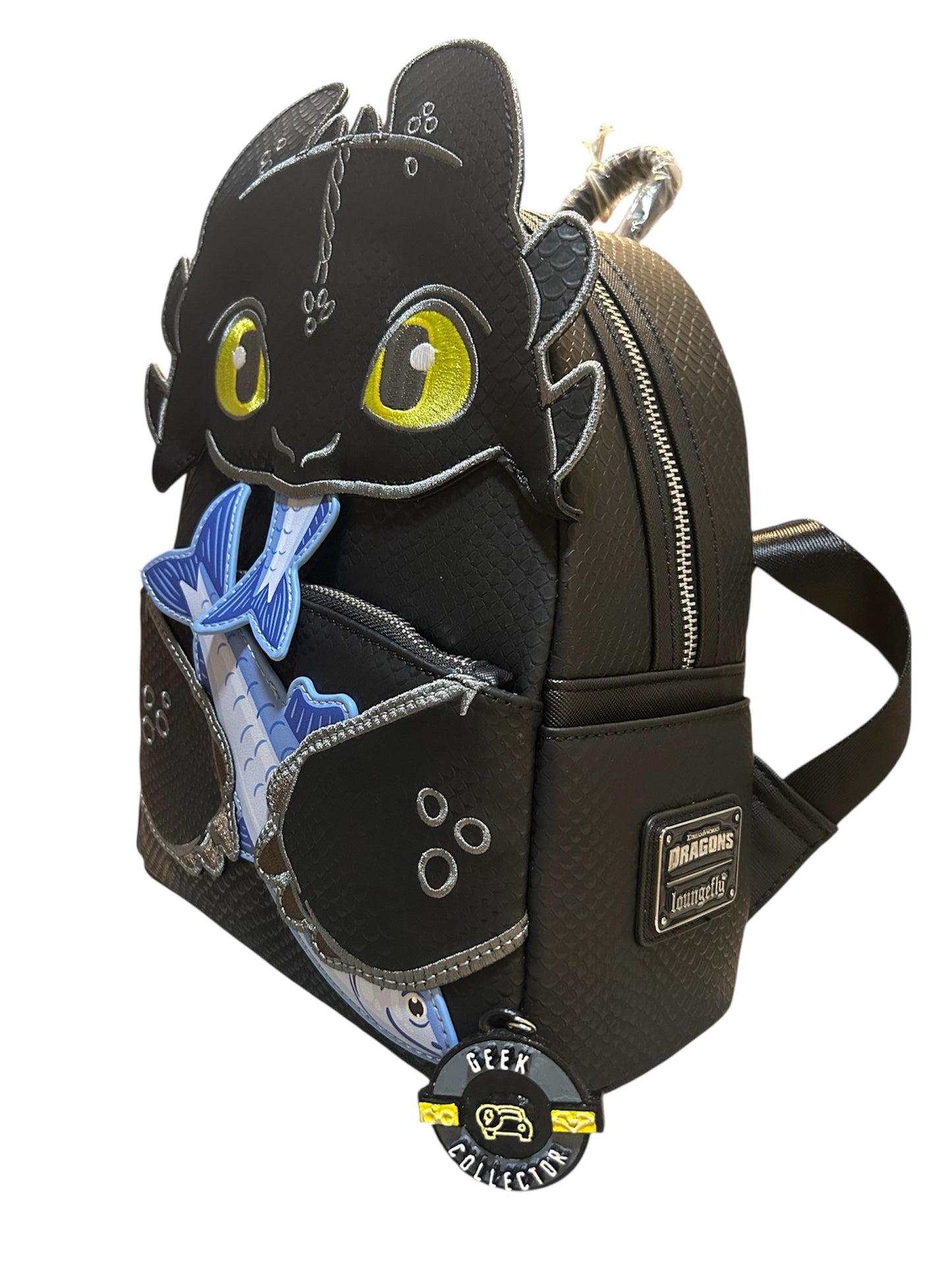Mini Mochila Loungefly: Cómo Entrenar a tu Dragón - Chimuelo (Toothless) con Pescado