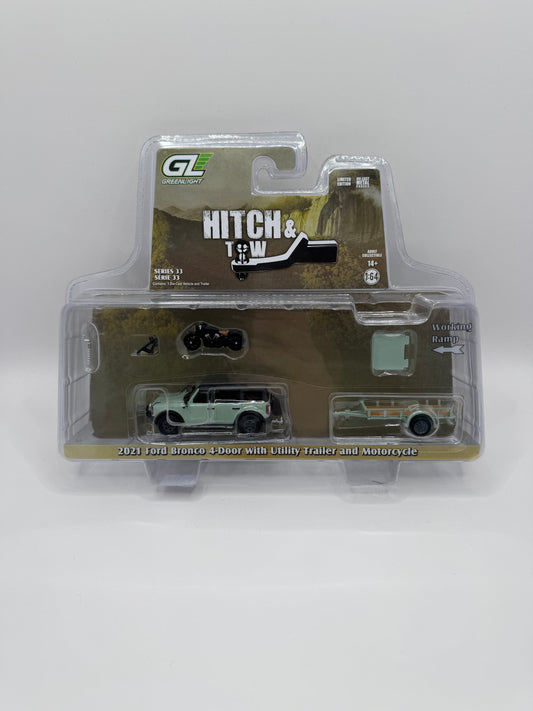 Greenlight 1:64 Hitch & Tow Serie 33 - 2021 Ford Bronco 4-Door con Remolque y Motocicleta